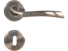 Linea Bertomani 201 poignée de porte avec rosaces 50mm set complet zamak bronzé